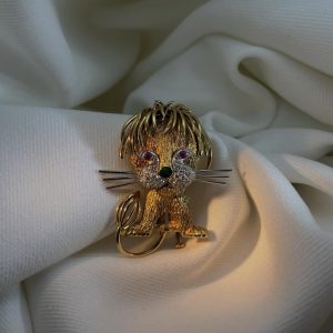 Broche Lion or jaune et pierres précieuses - Dépôt-vente