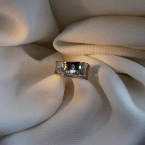 Bague vague or blanc et diamants - Dépôt-vente