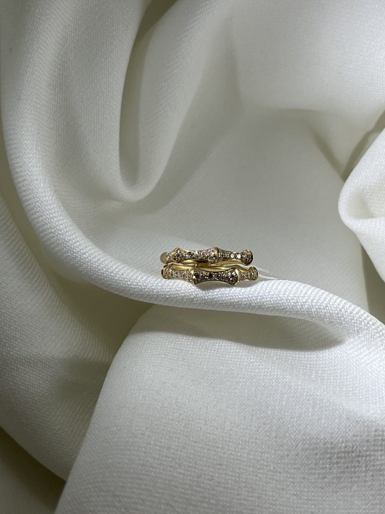 Bague squelette motif bambou en or jaune 18 carats et diamants